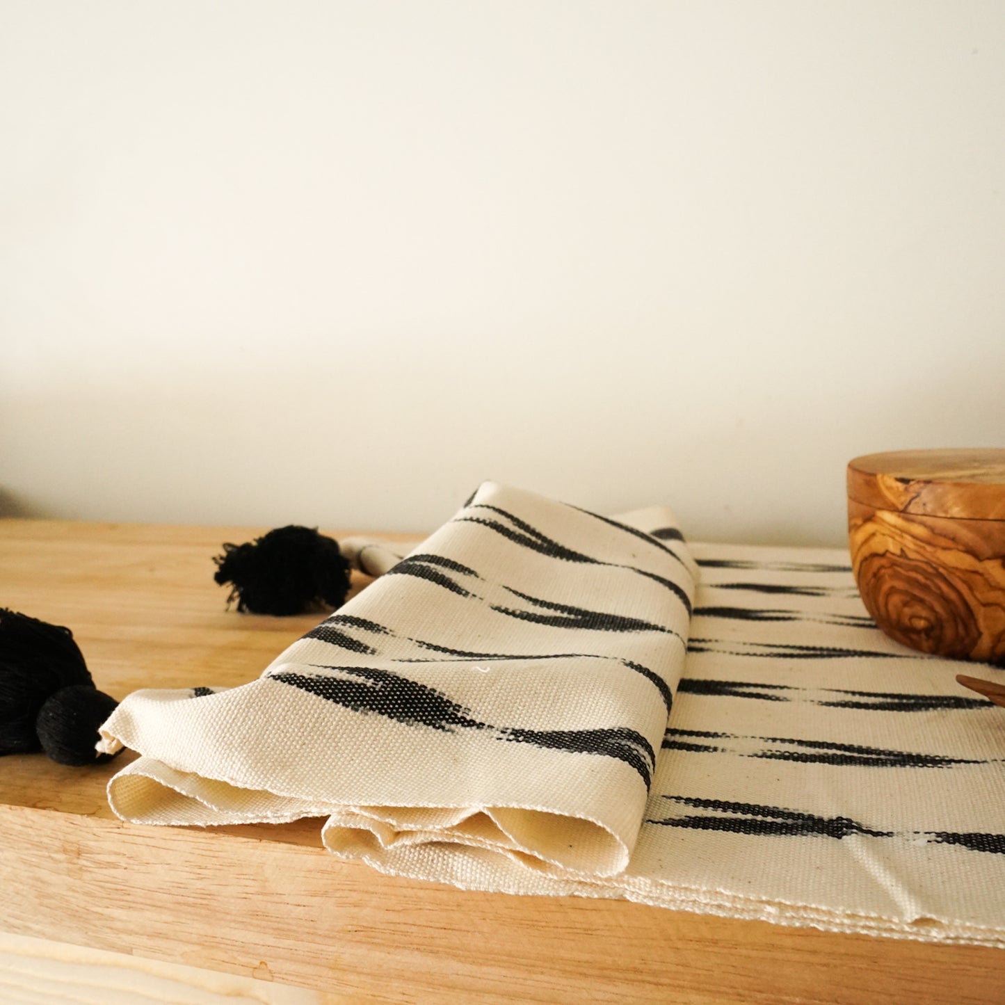 White Woven Table Runner with Black Tassels